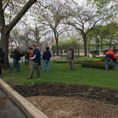 Grounds employees working a job